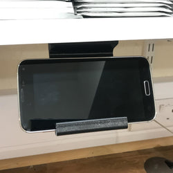 Under Shelf or Cabinet Mobile Phone Horizontal Phone Display in Black with Fixings Service Item Wayward Media 902814