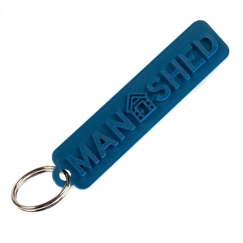 Man Shed Raised Text Key Ring Saphire Blue | Wayward Media