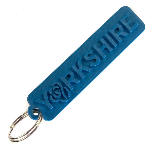 Yorkshire Raised Text Key Ring Saphire Blue | Wayward Media